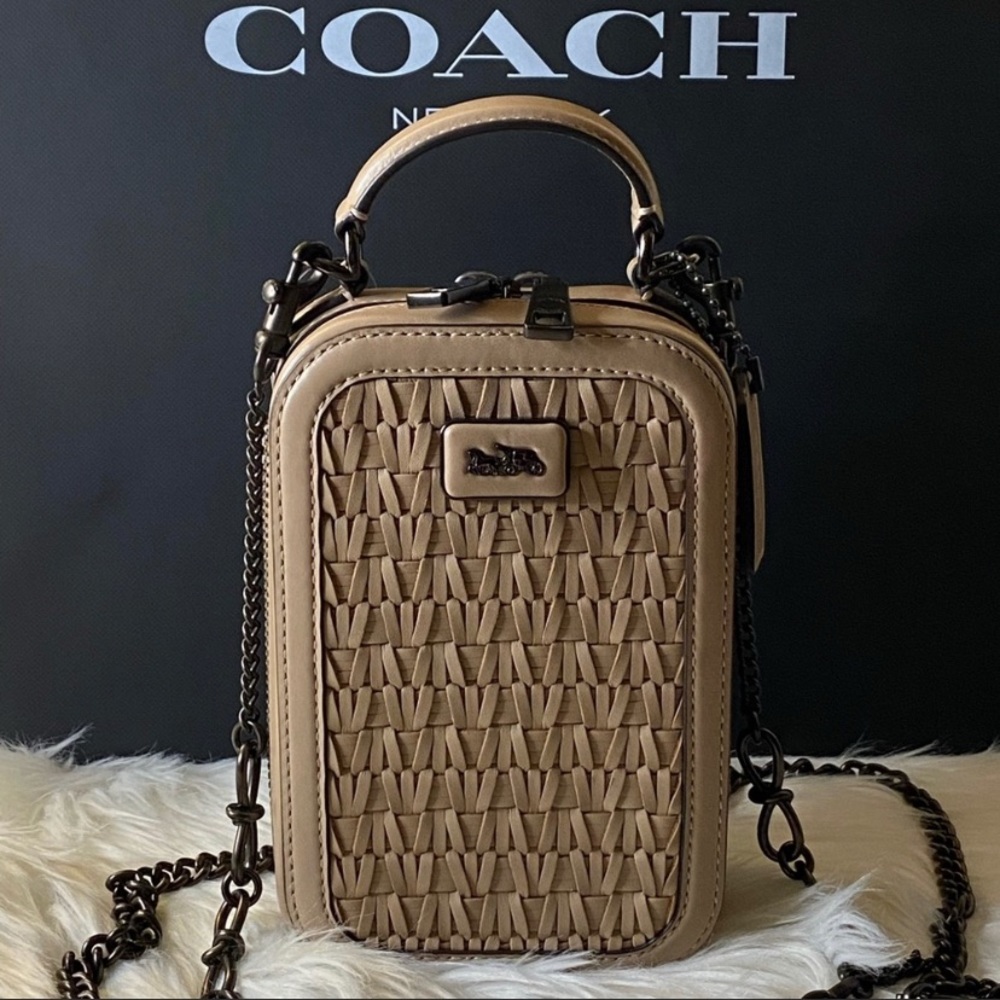 *SOLD**. Coach wolven hand bag